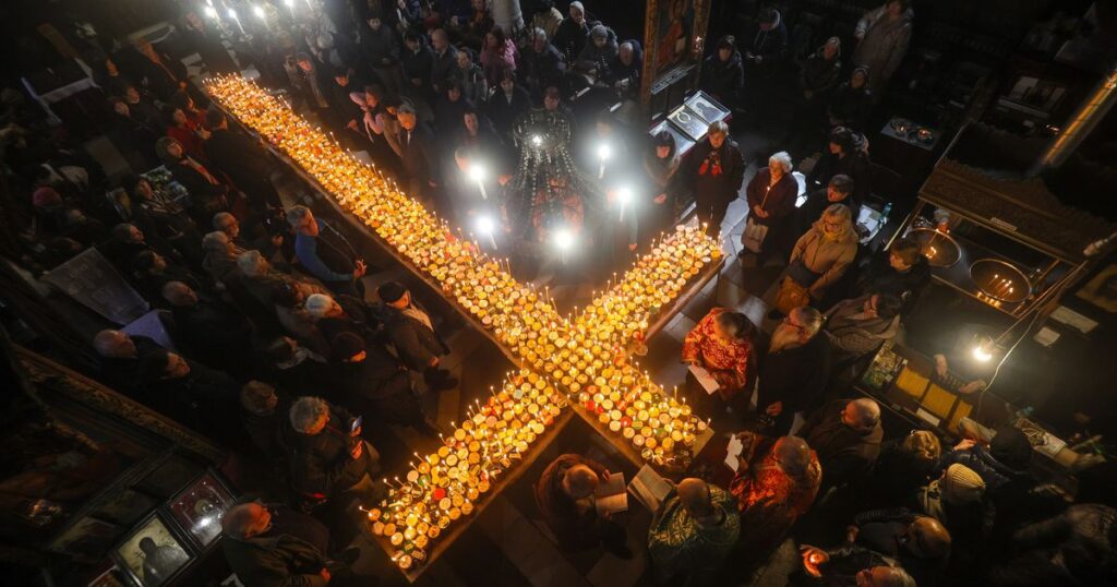 Bulgarians pray for bees and bless honey on St. Haralambos Day :: WRAL.com