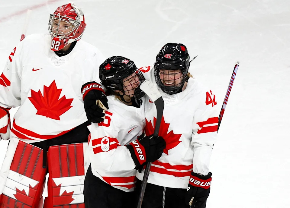 Milano Cortina 2026 Olympics - Ice Hockey - Women's Preliminary Round - Group A - Switzerland vs Canada - Milano Rho Ice Hockey Arena, Milan, Italy - February 07, 2026. Claire Thompson of Canada and Daryl Watts of Canada celebrate after the match against Switzerland REUTERS/Alessandro Garofalo TPX IMAGES OF THE DAY