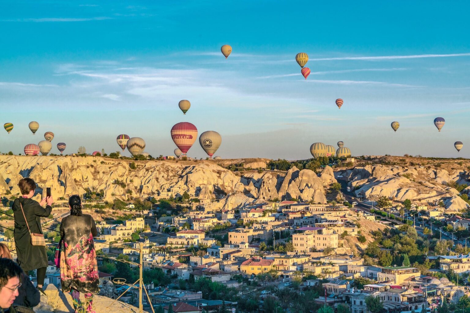 Tourists watching hot air balloons in Cappadocia. The popular Turkish TV drama Valley Of Hearts is filmed in the region, which has experienced a spike in visitor numbers
