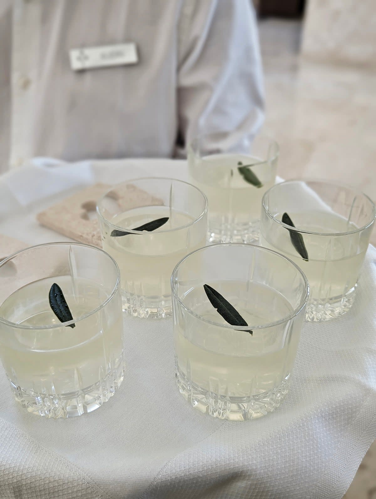 Olive oil has escaped the kitchen entirely, finding its way into cocktails and wellness tonics where bitterness, aroma and novelty do much of the talking (Amira Arasteh)