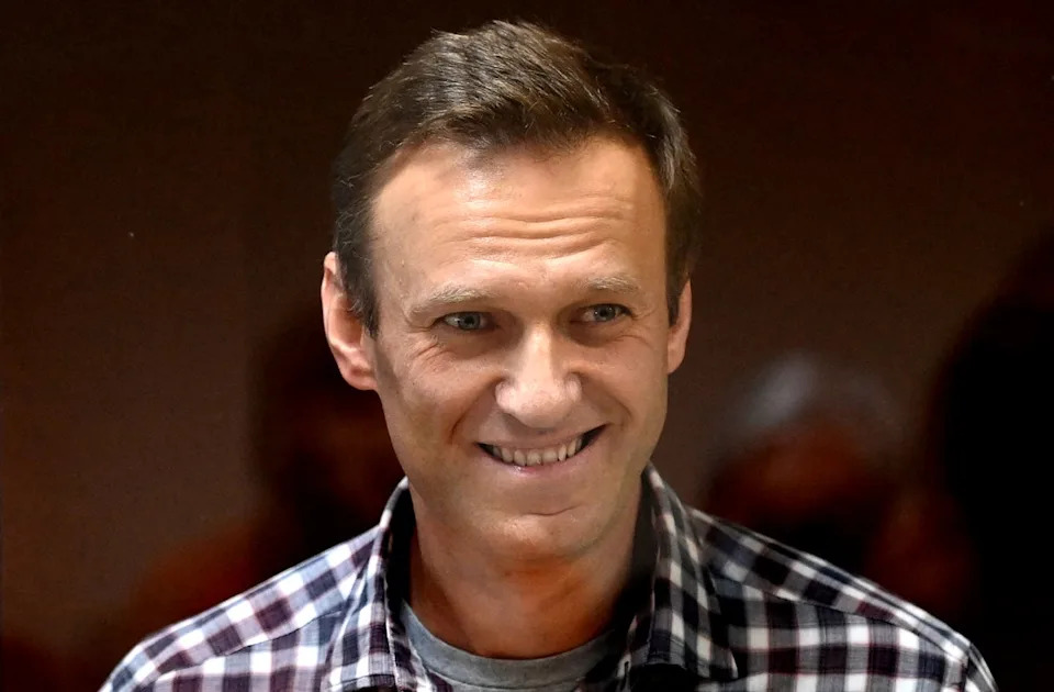 Russian opposition leader Alexei Navalny stands inside a glass cell during a court hearing at the Babushkinsky district court in Moscow on 20 February 2021 (AFP via Getty)