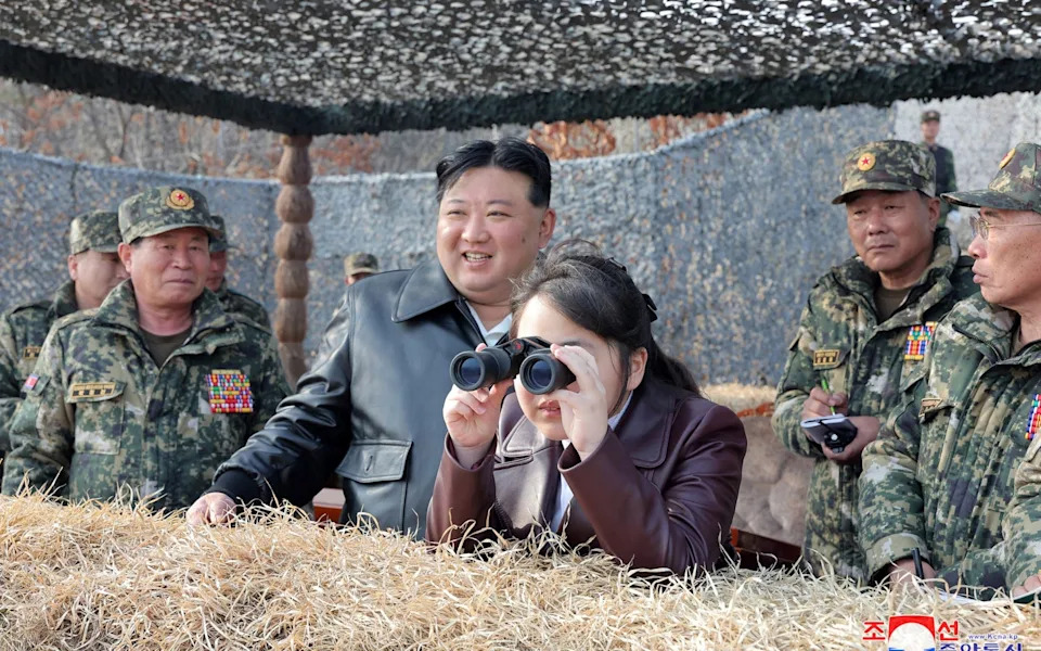 The North Korean dictator and his daughter inspecting the training of soldiers in the Korean People's Army