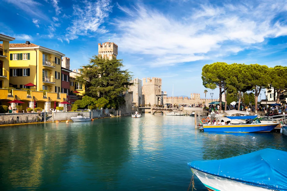 Holidays in Italy - Scenic view of the marina in the tourist resort of Sirmione on Lake Garda