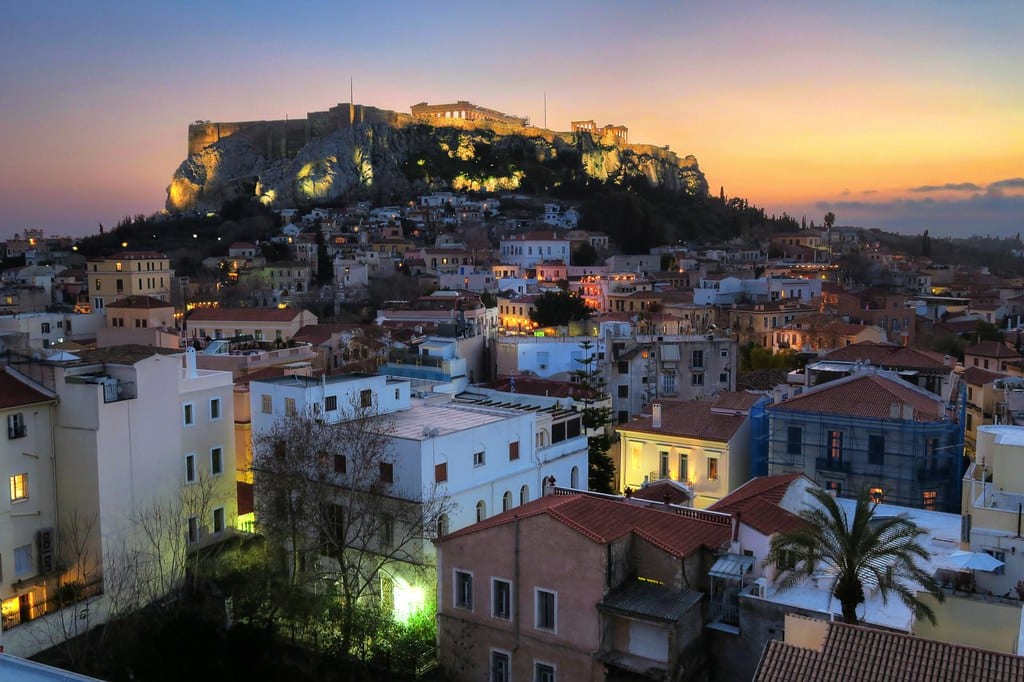 Athens Acropolis from Plaka night view. Greeks Housing EU
