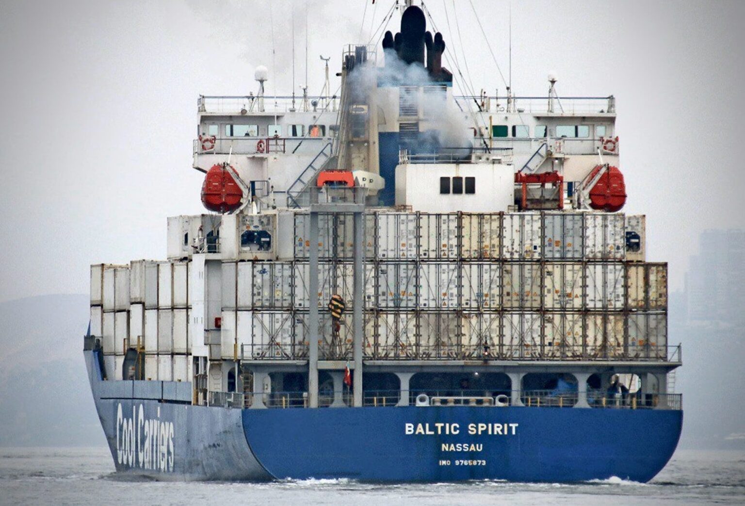 Estonia Releases Baltic Spirit After Failed Drug Search Stern view of the con-ro vessel BALTIC SPIRIT underway, with containers stacked on deck.