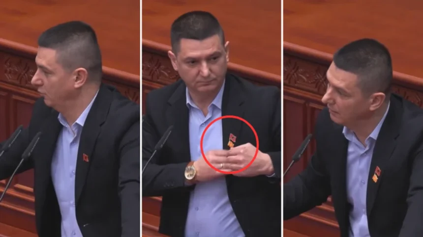 Albanian MP in Macedonia with national flag on suit is reprimanded by Prime Minister Mickoski and given the Macedonian flag