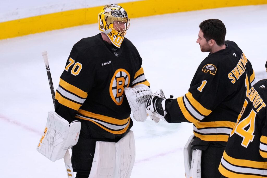 Bruins' goaltenders Joonas Korpisalo (left) and Jeremy Swayman will be bound for the Olympics in Italy. Korpisalo became the ninth Bruin named to an Olympic roster after he was selected as an injury replacement for Buffalo's Ukko-Pekka Lukkonen. Swayman will backstop the United States Olympic squad.