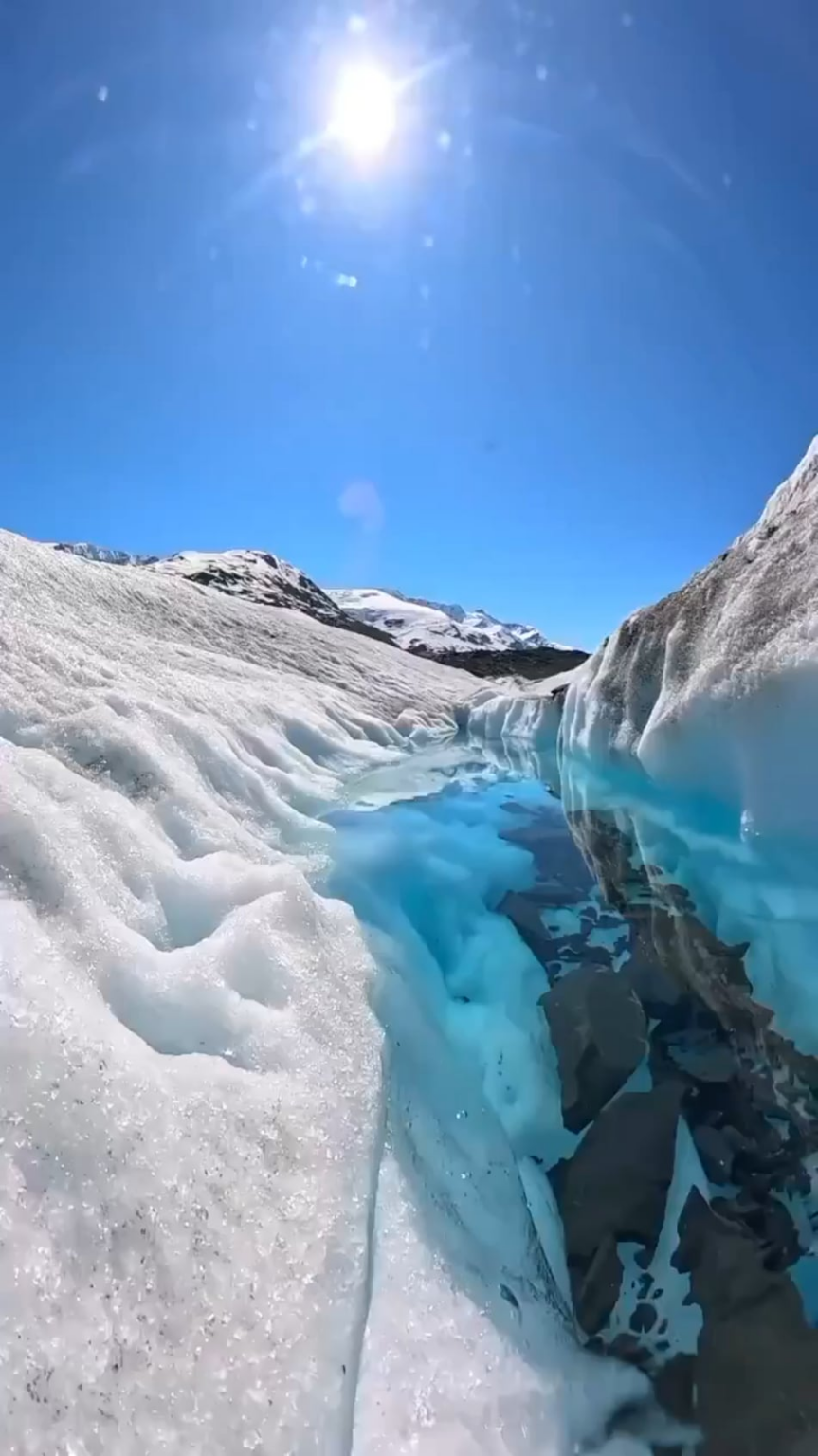 Crystal clear glacier melt water in Alaska