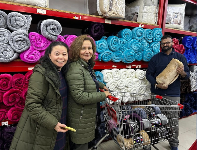 Latter-day Saint volunteers in Portugal gather and organize donated blankets in February 2026 after deadly storms hit the country.