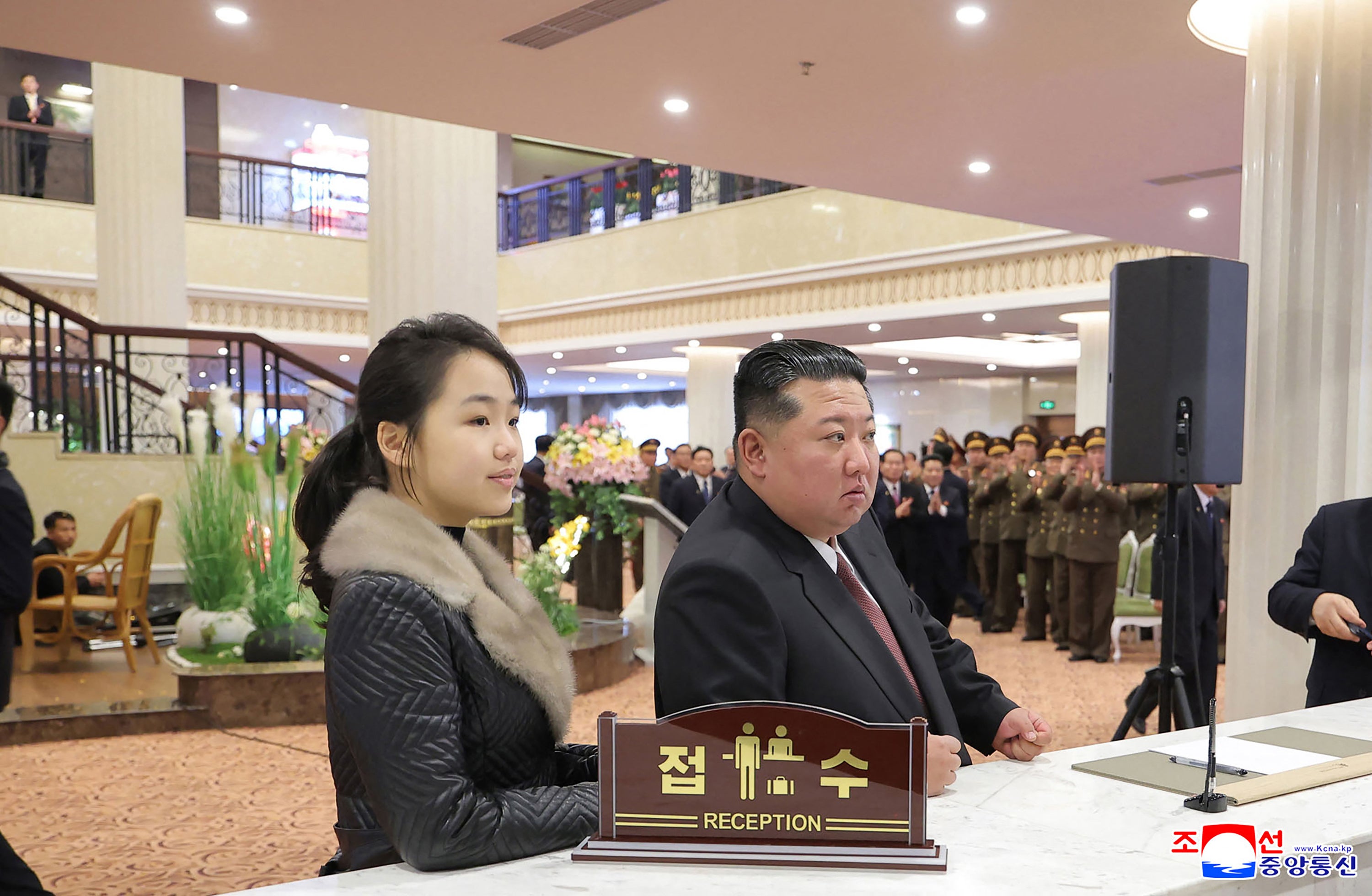 FILE: Kim Jong Un (right) and his daughter Ju Ae inspect the Milyong Hotel, which was recently completed in the Samjiyon tourist district of Ryanggang Province