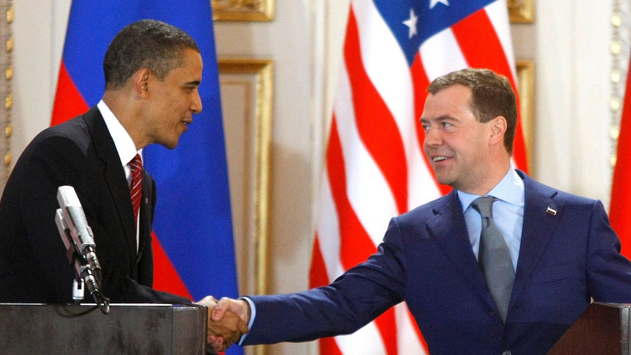 U.S. President Barack Obama, left, and his Russian counterpart Dmitry Medvedev, right, shake hands at a news conference at the Prague Castle in Prague, Czech Republic,, April 8, 2010, after signing the New START treaty reducing long-range nuclear weapons. (AP Photo/Mikhail Metzel, File)