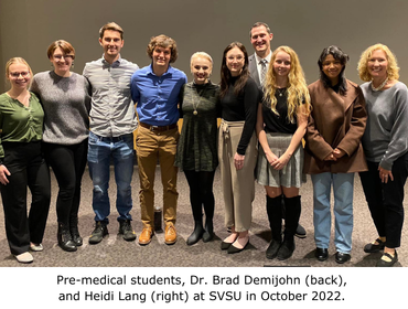 Pre-medical students, Dr. Brad Demijohn, and Heidi Lang at SVSU in 2022.
