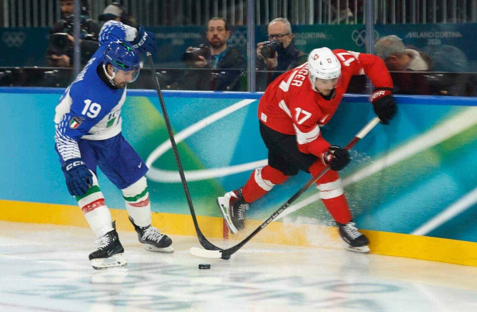 Olympics: Switzerland Shuts Out Italy 3-0