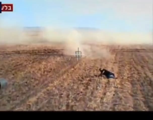 Israeli Merkava fires and runs over a Hamas fighter, October 7th 2023