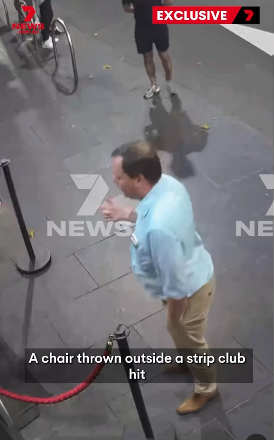 Man throws a chair towards bouncer, knocks his mate out instead Man throws a chair towards bouncer, knocks his mate out instead