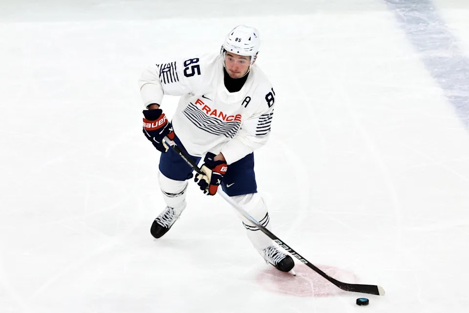 MILAN, ITALY - FEBRUARY 12: Alexandre Texier #85 of Team France in action during the Men's Ice Hockey - Group A match between Team Switzerland and Team France on day six of the Milano Cortina 2026 Winter Olympic games at Milano Santagiulia Ice Hockey Arena on February 12, 2026 in Milan, Italy. (Photo by Xavier Laine/Getty Images)