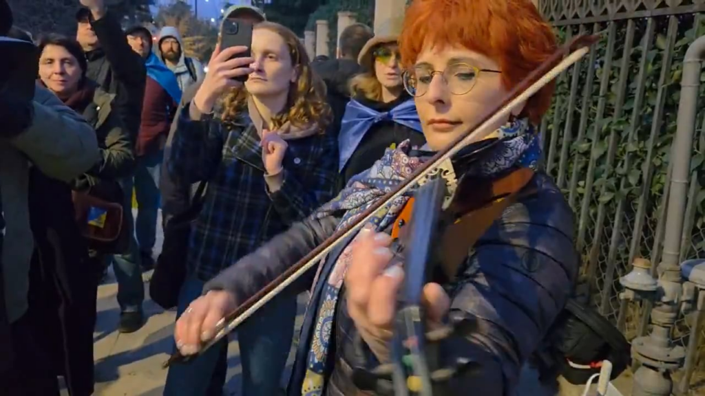 Ukrainian anthem in front of the Ukrainian Embassy in Tbilisi on the fourth anniversary of the full-scale invasion made by Russia