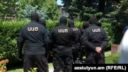 Armenia - Masked officers of the National Security Service raid the Echmiadzin headquarters of the Armenian Apostolic Church, 27 June, 2025.