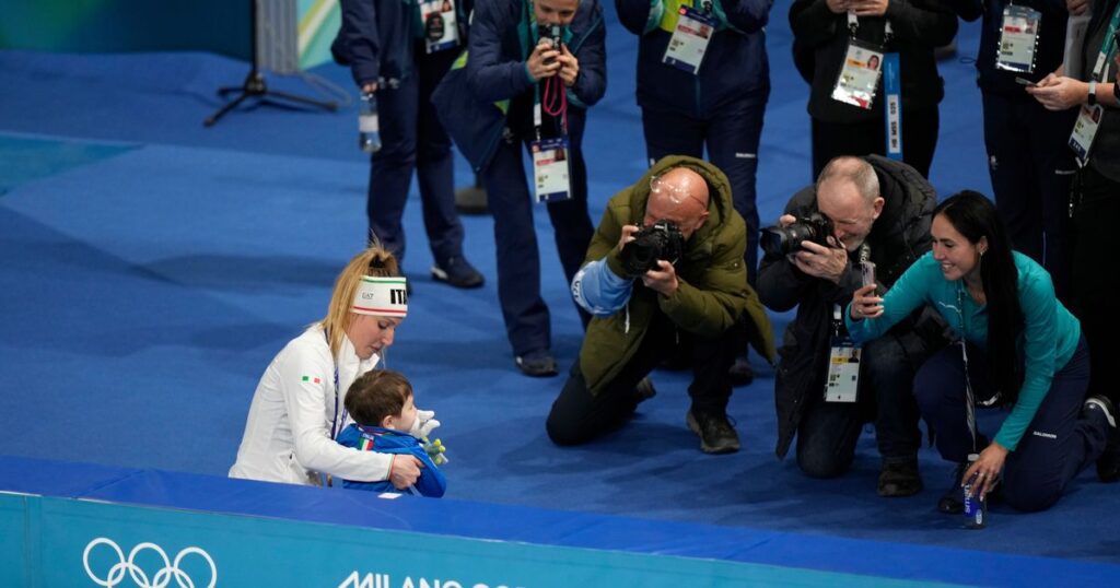 Francesca Lollobrigida hugs her son after winning Italy's first gold of the Milan Olympics :: WRAL.com