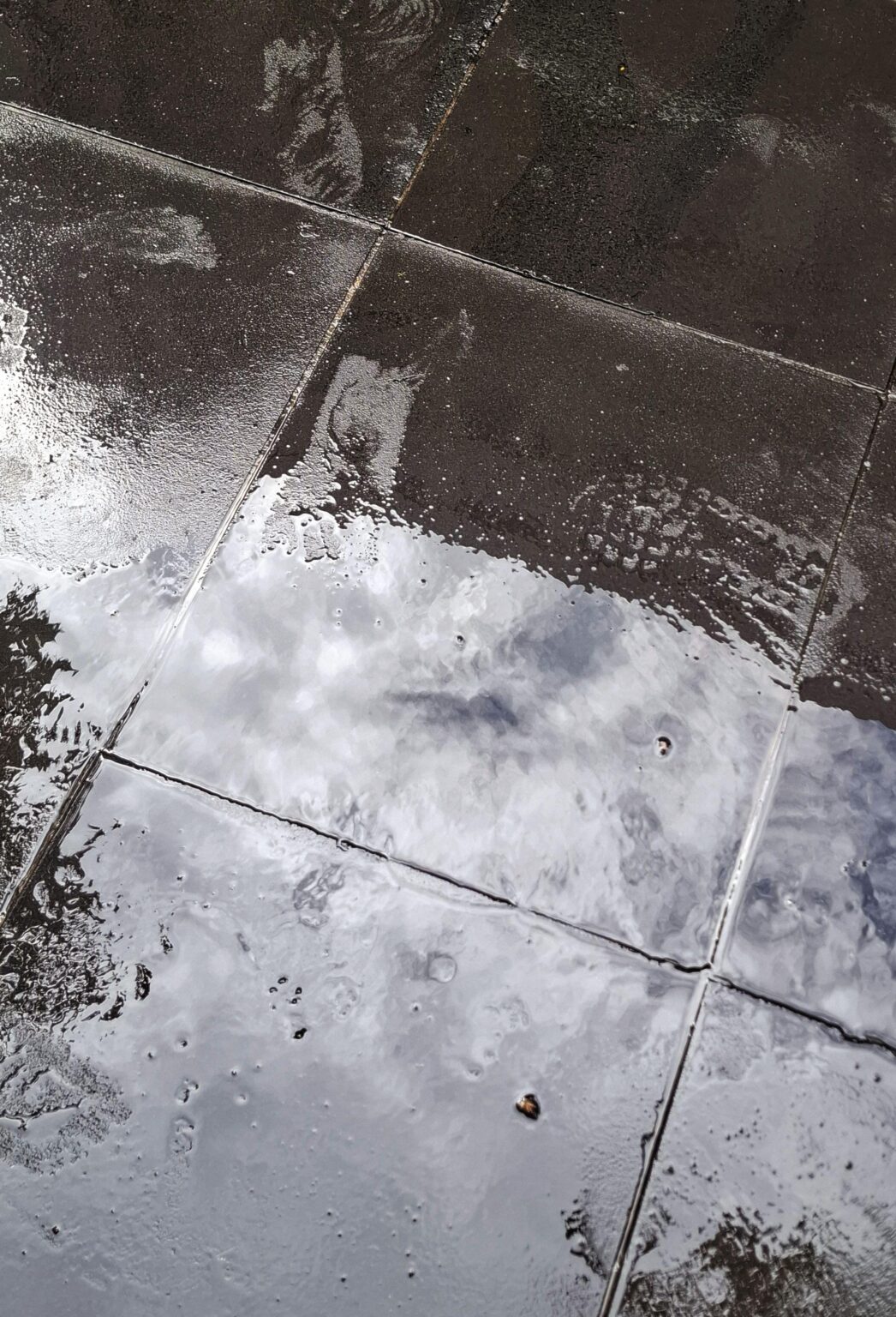Say it's a particularly rainy afternoon in Melbourne, and the footwear you chose to wear this morning, happened to turn into killer ice skates once it touches the wet bluestone; would it be socially acceptable to go around barefoot if it's going to be the only thing stopping you from eating the curb