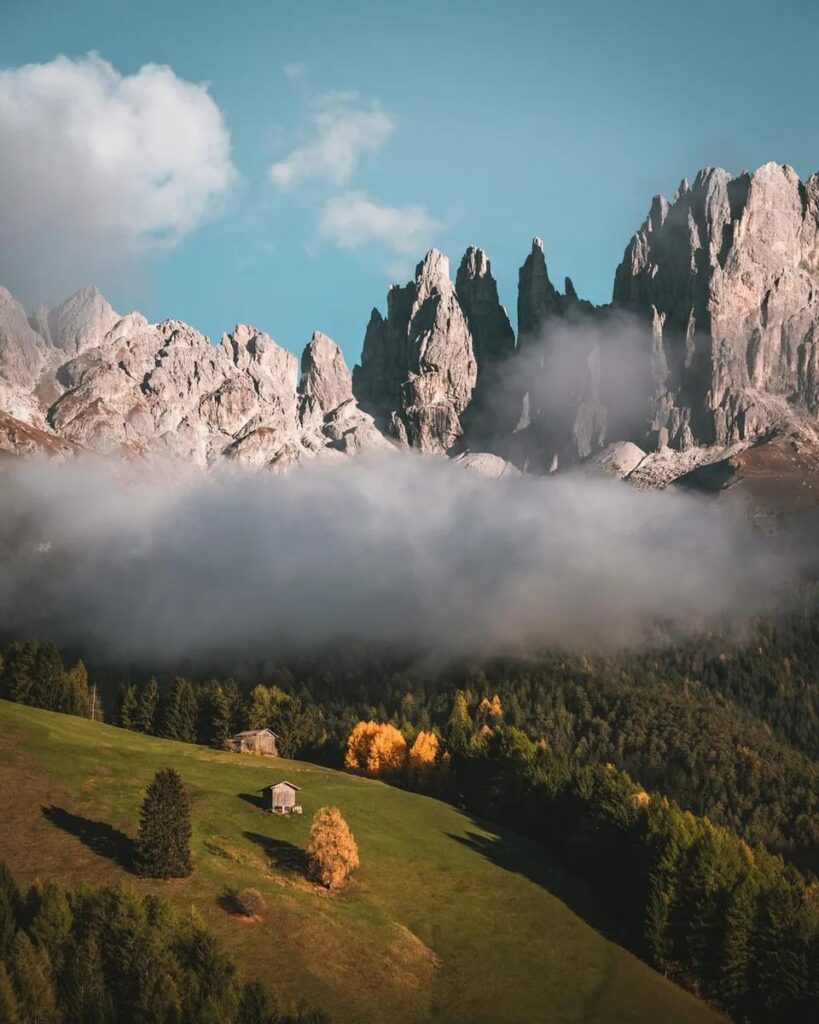“The magnificent misty landscape of the Dolomite Alps
