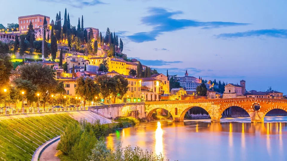 Verona city downtown skyline, cityscape of Italy at sunset