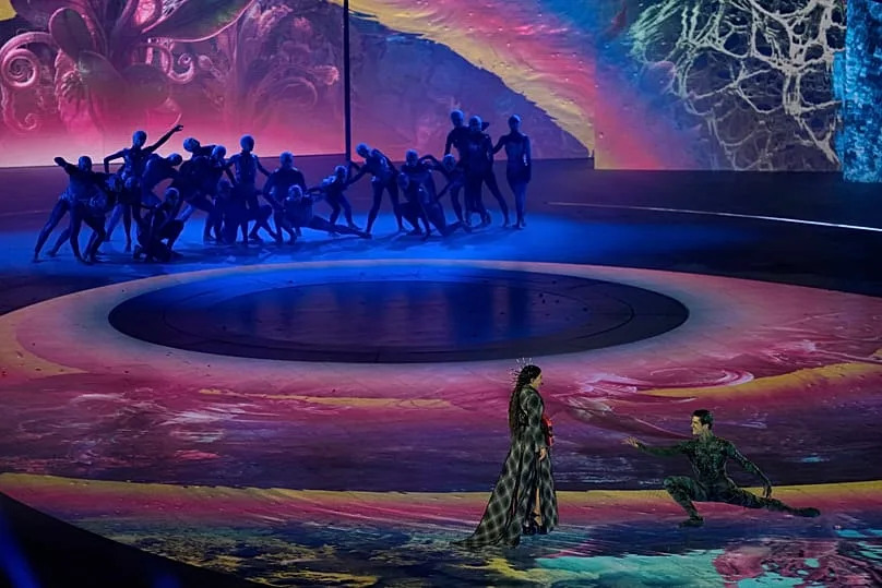 Singer Joan Thiele, left, and dancer Roberto Bolle perform during the closing ceremony of the 2026 Winter Olympics, in Verona, Italy, Sunday, Feb. 22, 2026.