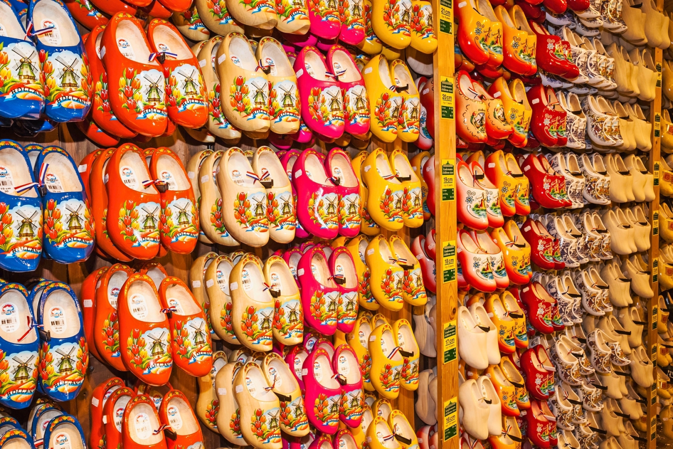Colorful souvenir clogs on display.