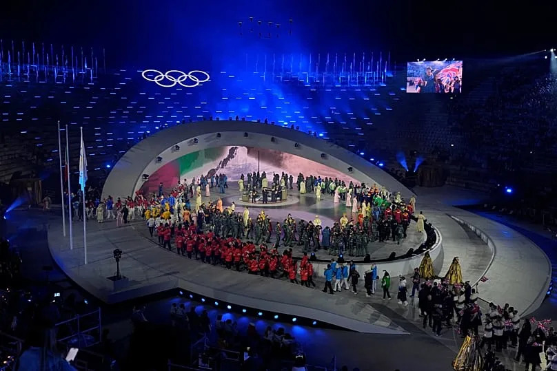 Athletes attend the closing ceremony of the 2026 Winter Olympics, in Verona, Italy, Sunday, Feb. 22, 2026. 