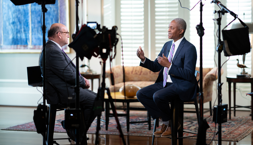 Raphael Bostic being interviewed by Steve Liesman of CNBC