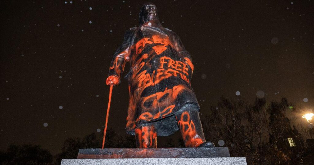 Winston Churchill Parliament Square statue vandalised with 'war criminal' paint