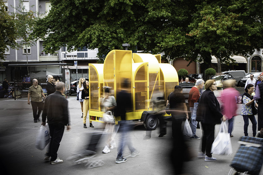 modular yellow greenhouse travels on wheels through portugal for seed germination