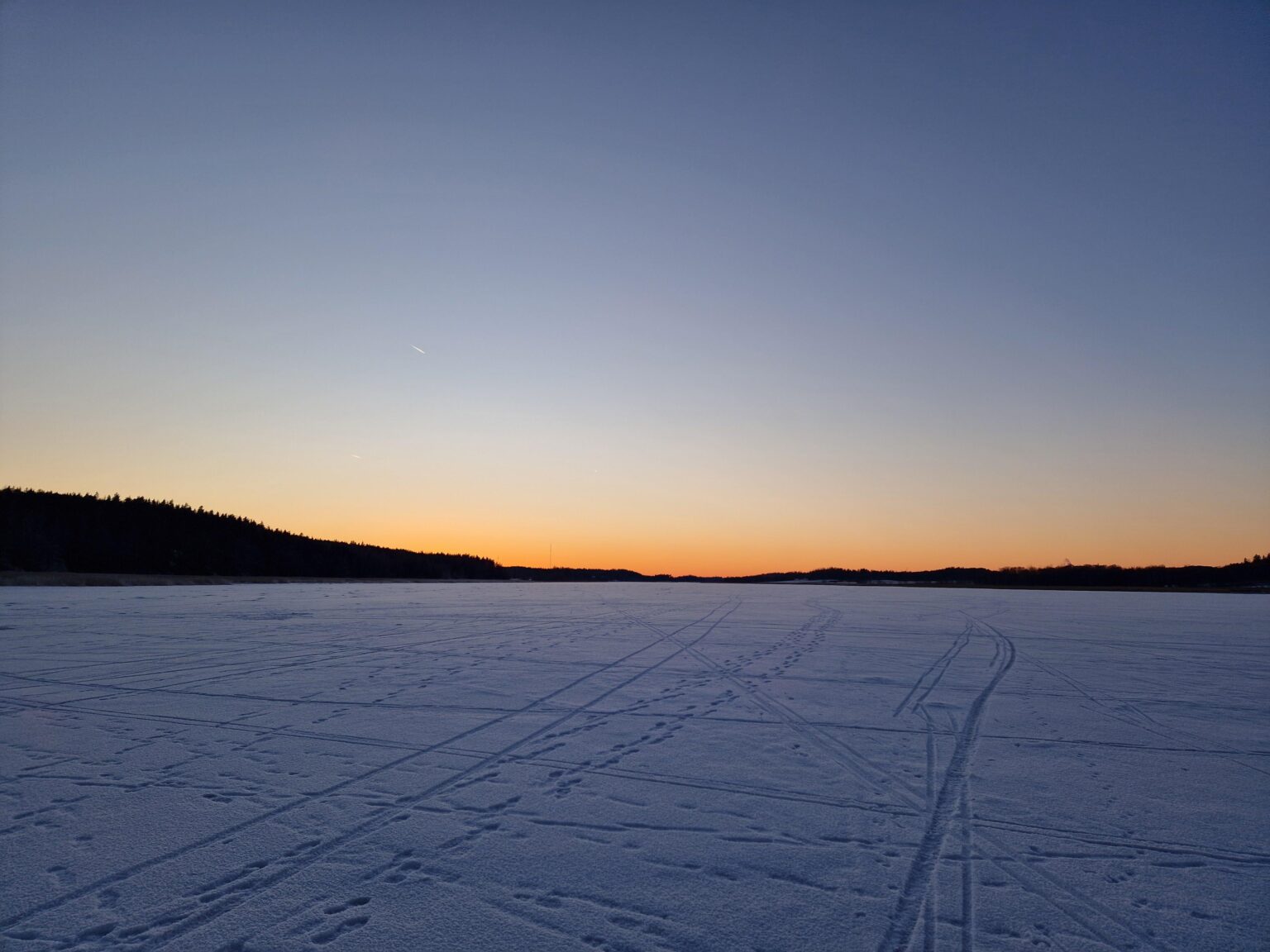 A nice winter day to enjoy the sunset from the ice