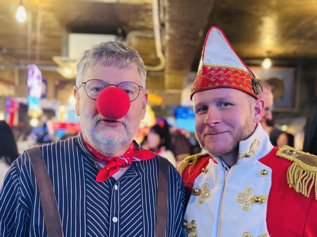 German Embassy's Deputy Ambassador Joern Beissert (left) and David Bieger, public diplomacy and press officer at the German Embassy, pose for a photo at the German Carnival event in Sinchon, Seoul, on Saturday. (Sanjay Kumar/ The Korea Herald)