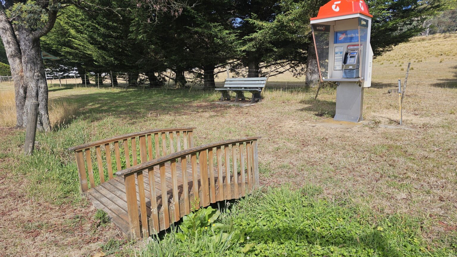A tiny wooden bridge to a working pay phone. Aberfeldy, Vic High-Country.