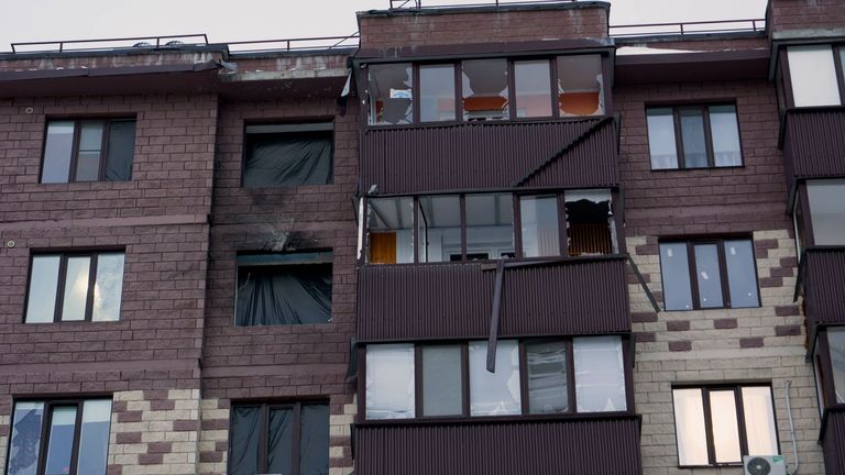 An apartment building in Belgorod after it was hit by drones
