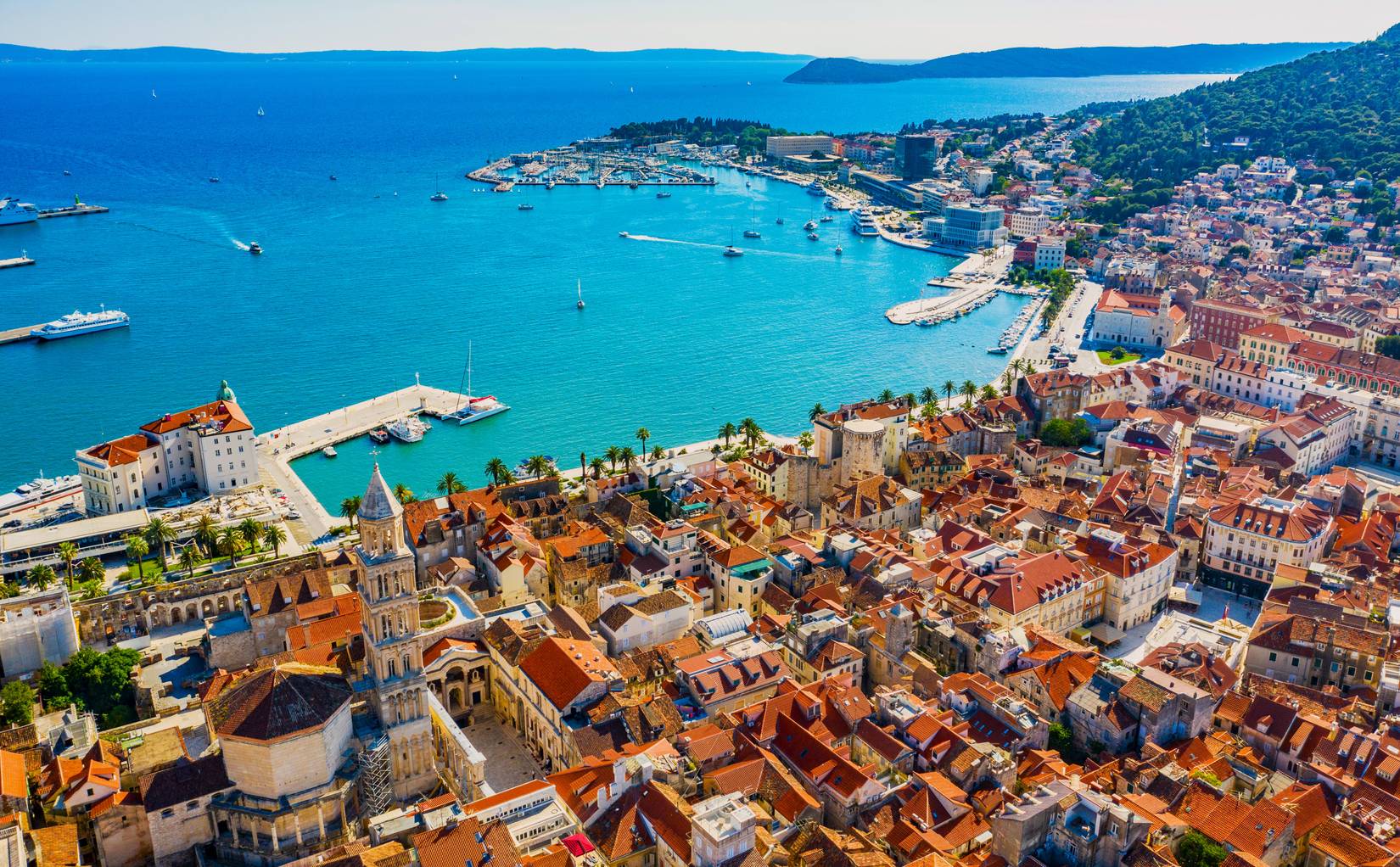 Aerial view of the ocean and old town in Split, Croatia, Europe, on a sunny day