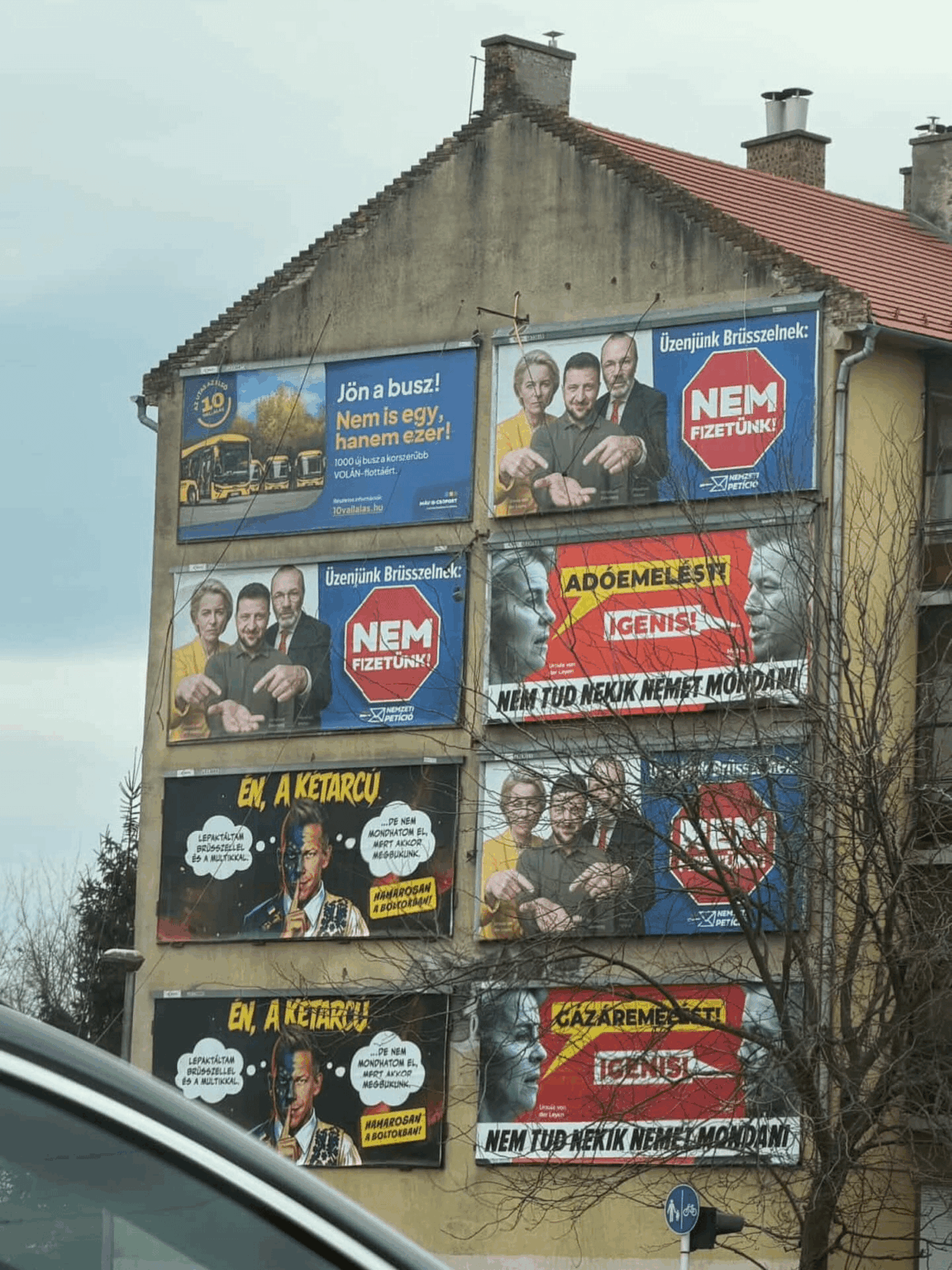 These billboards can be found near kindergarten, school, hospitals. Everywhere you go, and look around, that's what you see currently in Hungary. The government lead by orban spends insane amount on propaganda ads.  We just hope that in 50 days (after elections) these will disappear forever.