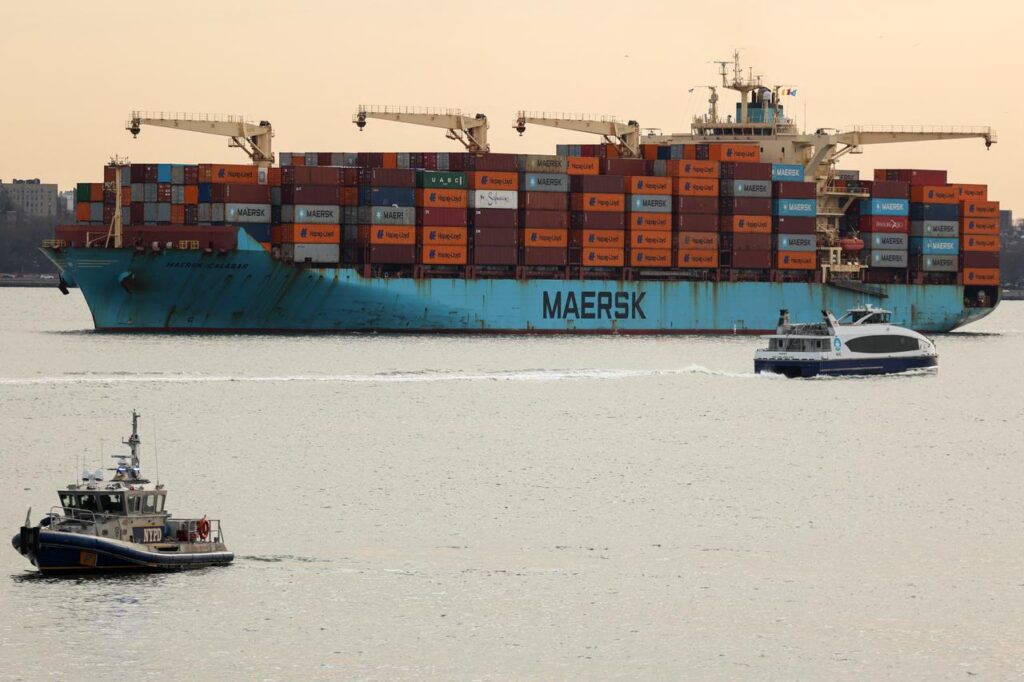 A Maersk cargo ship loaded with shipping containers navigates through New York Bay, January 23, 2026. (AFP Photo)