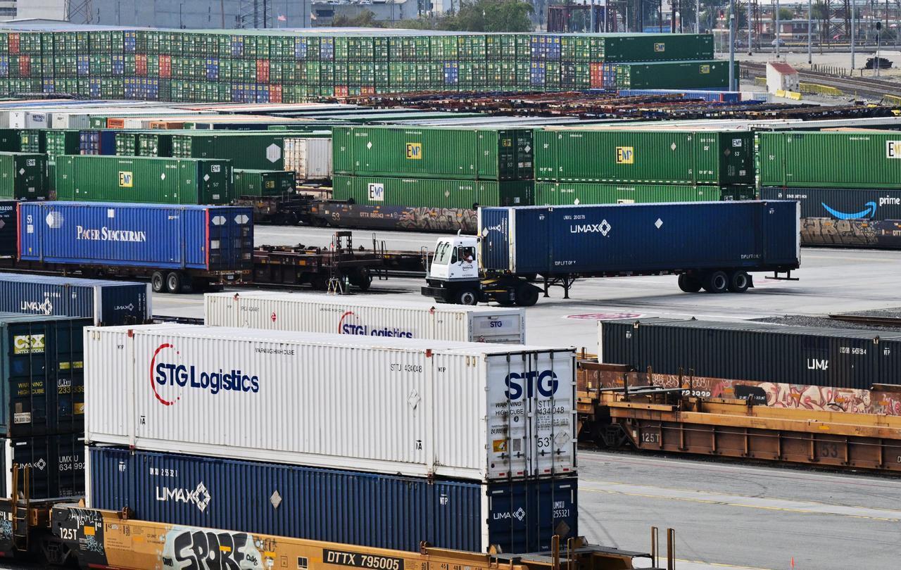 Shipping containers and container trucks seen at the LATC-Union Pacific Los Angeles Transportation Center rail yard in Los Angeles, California, February 24, 2026. (AFP Photo)
