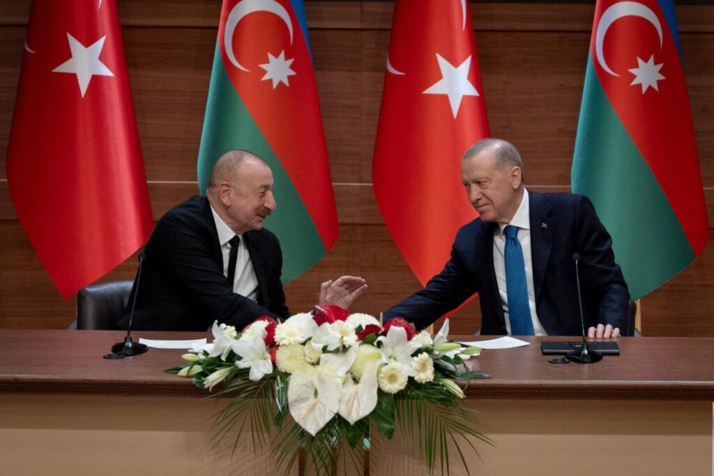 President Recep Tayyip Erdogan (R) and Azerbaijani President Ilham Aliyev shake hands during the opening ceremony of Igdir-Nakhchivan Natural Gas Pipeline at Presidential Complex in Ankara, Türkiye on March 5, 2025. (AA Photo)