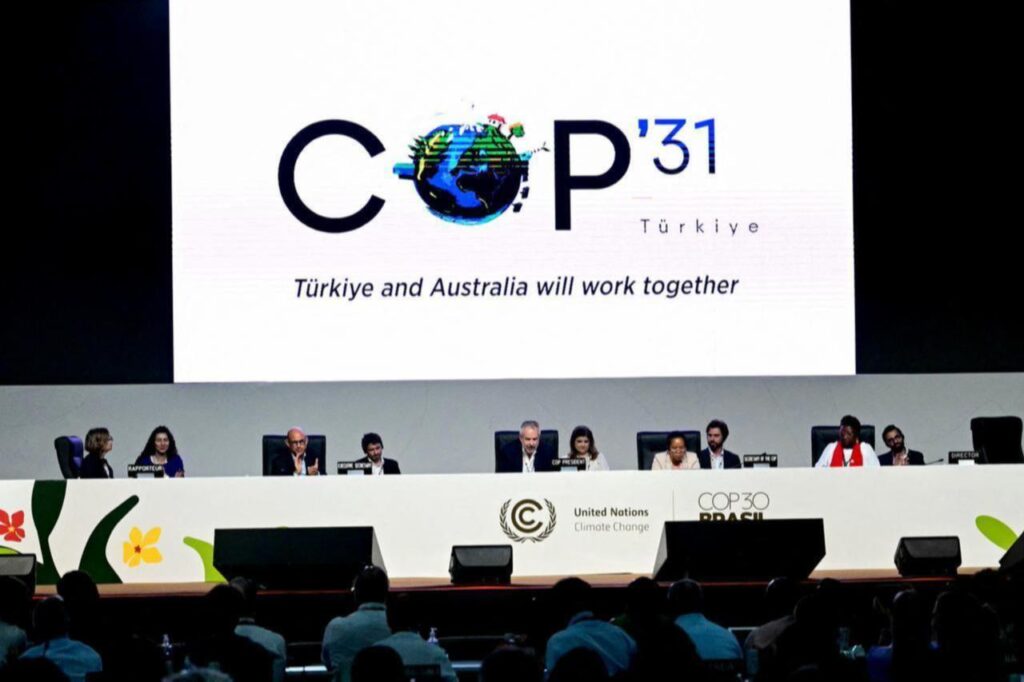 A screen shows the COP31 logo organized by Türkiye and Australia during the COP30 UN Climate Change Conference in Belem, Para state, Brazil on November 22, 2025. (AFP Photo)