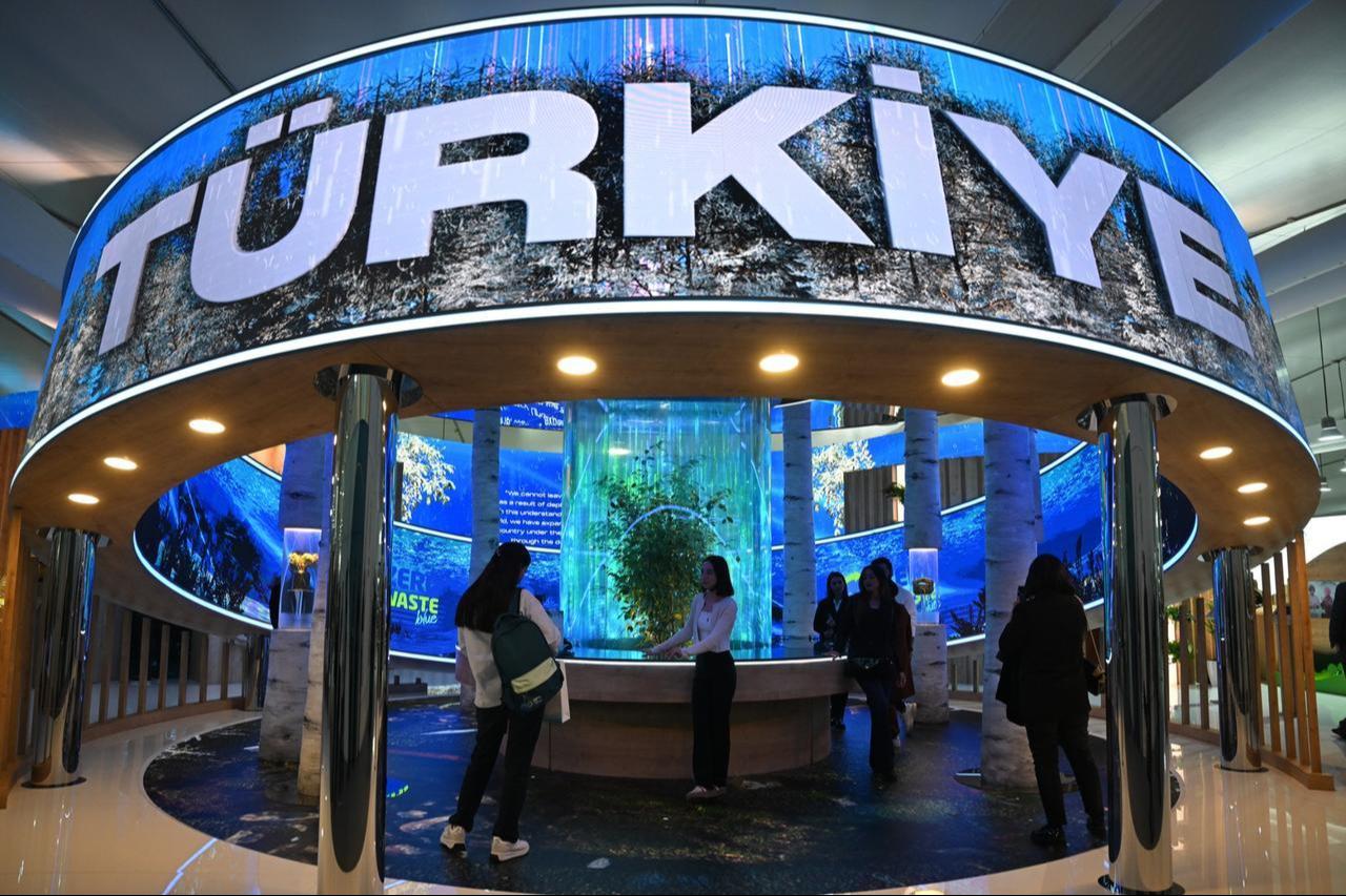 Visitors visit the “Zero Waste” themed country pavilion of the Turkish Directorate of Communications as part of the 29th Conference of the Parties to the United Nations Framework Convention on Climate Change in Baku, Azerbaijan on November 12, 2024. (AA Photo)