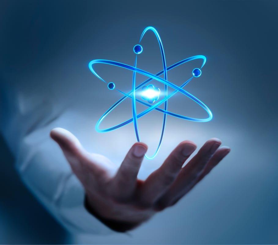Is NuScale Power the Next Nuclear Millionaire Maker — and a Future Dividend Giant? A hand holding a nuclear power symbol.