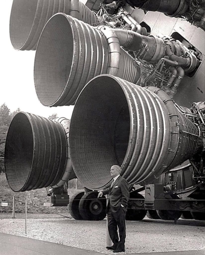 Dr von Braun stands beside the five F-1 engines of the Saturn V dynamic test vehicle, now on display at the Space and Rocket Centre in Huntsville, Alabama.