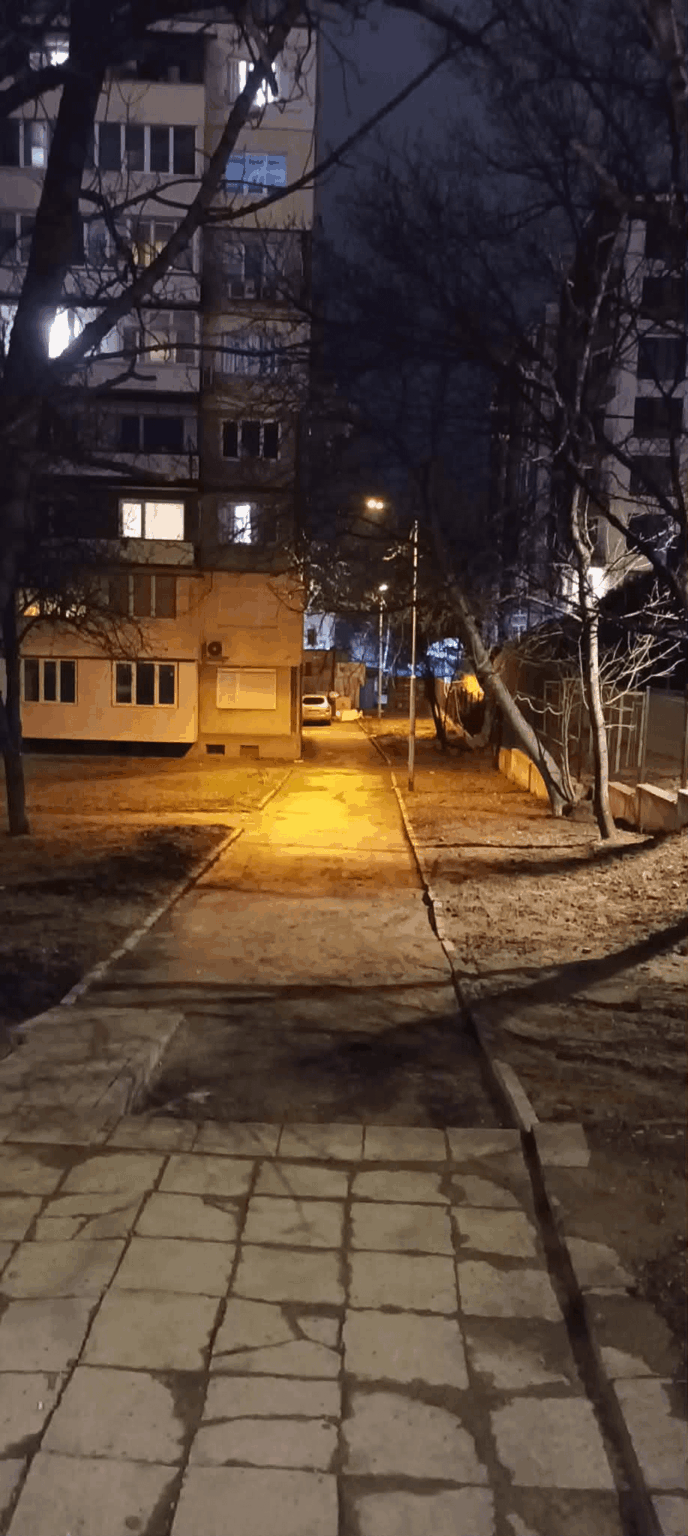 Sodium lamps begin to fade amid the night cityscape. I'll probably miss them when they start disappearing.