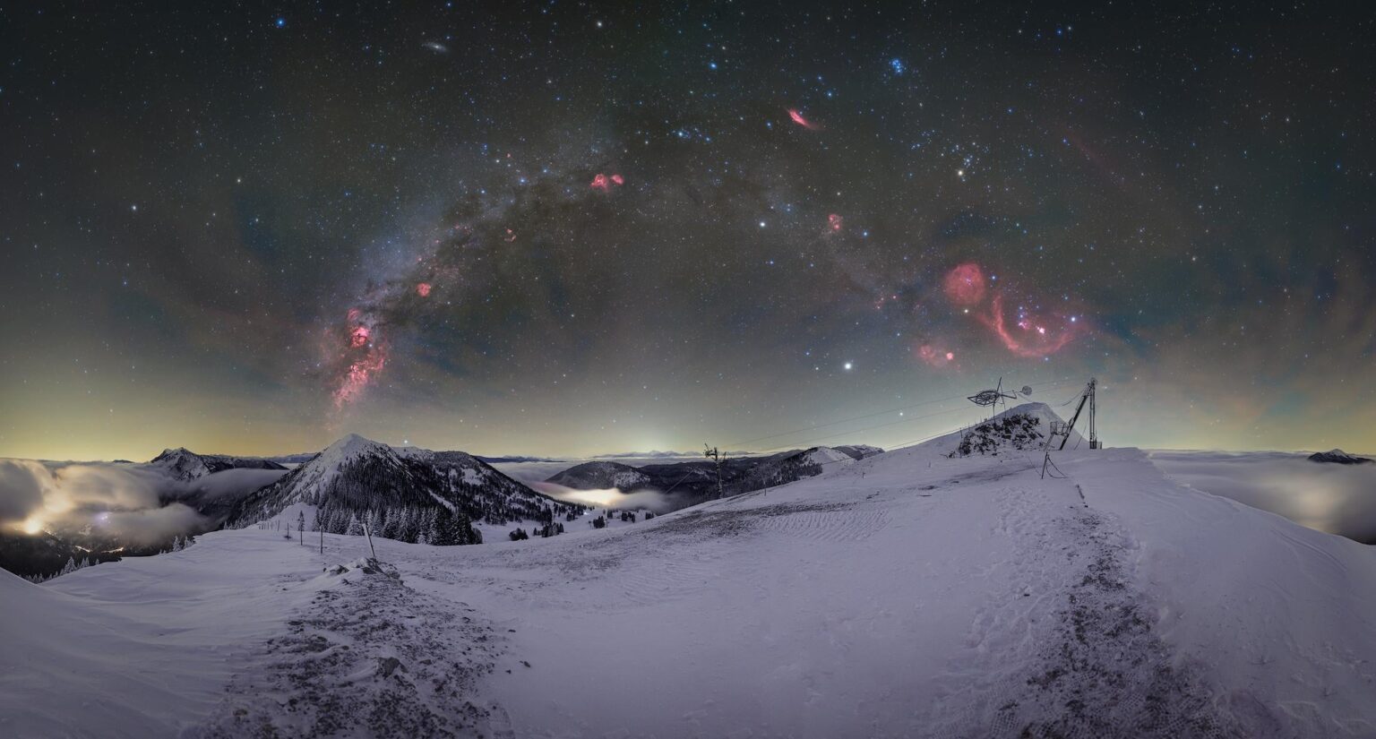 Snow-capped landscape, fog in the valleys below and a star-filled sky above (Soriska planina, Slovenia)(OC)(2200x1182)