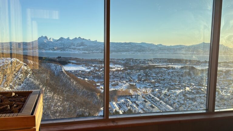 Stunning view over the city and mountains from the sauna in the Wood Hotel Bodø. Photo: David Nikel.