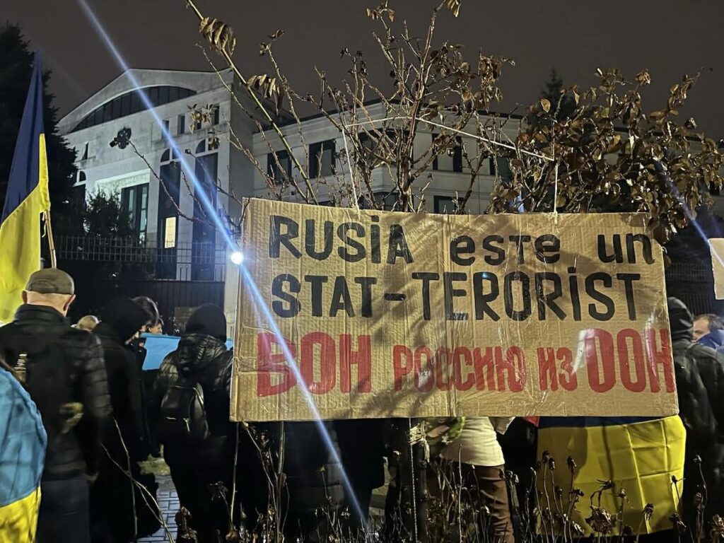 Protest at the Russian Embassy in Chisinau on the day marking four years of war in Ukraine. People chant: "Putin criminal" and "Slava ZSU"