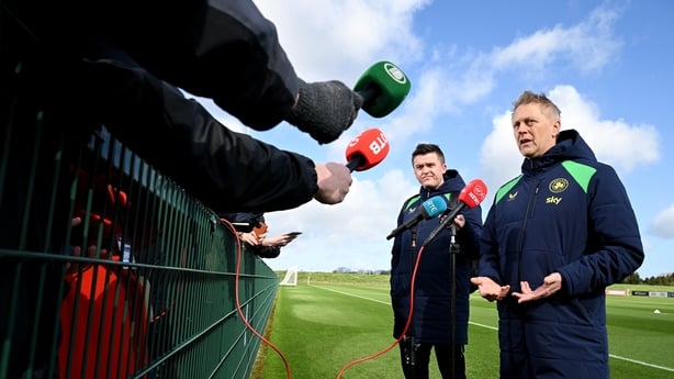 Head coach Heimir Hallgrimsson speaks to media, accompanied by communications manager Kieran Crowley before a Republic of Ireland men's training session at the FAI National Training Centre in Abbotstown, Dublin.